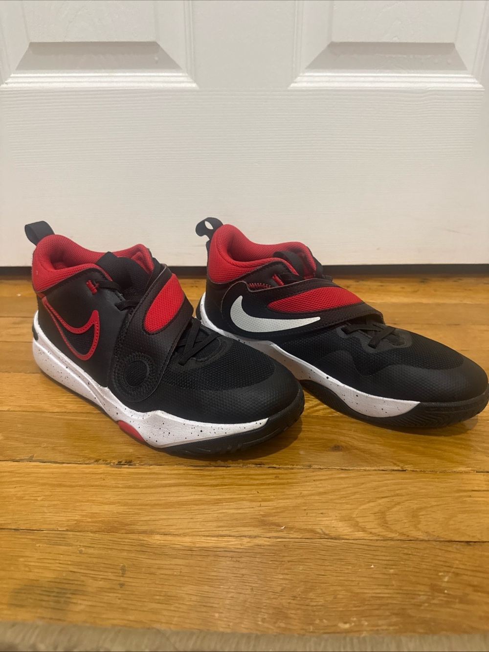 Nike Team Hustle Kids Black and Red Velcro Strap Sneakers - Picture 2 of 7